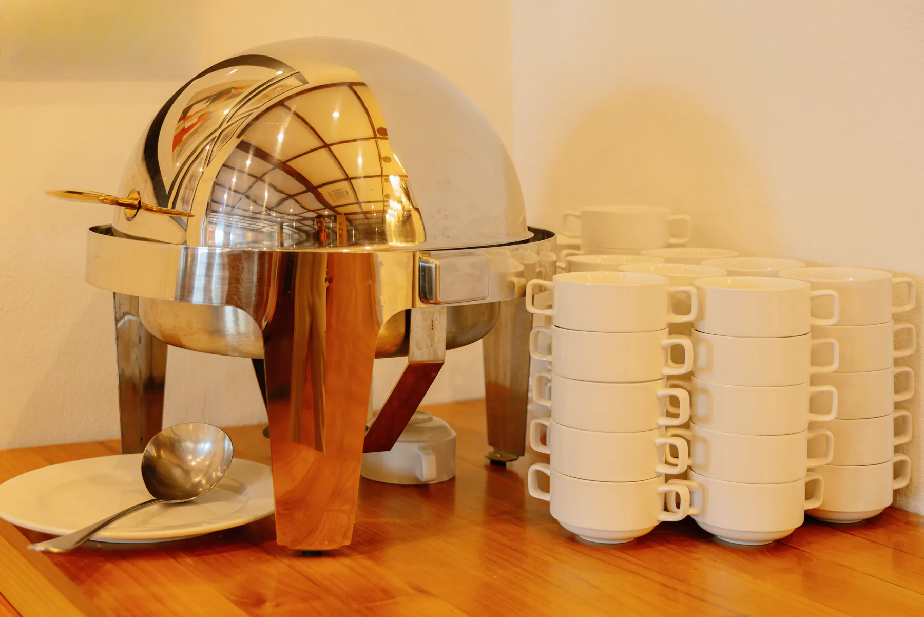 Chafing dishes and stacked service plates