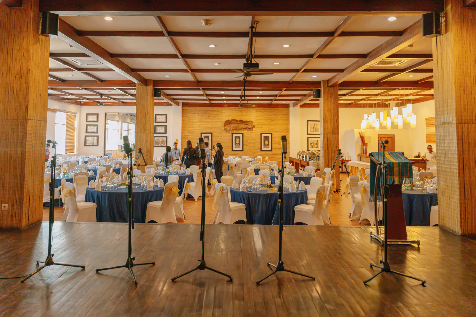 The main room with a stage and microphones
